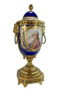 FRENCH, POSSIBLY SEVRES, 19TH CENTURY HAND PAINTED ORMOLU URN VASE