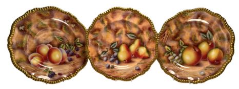 THREE DAVID BOWKETT, EX WORCESTER, HAND PAINTED PORCELAIN FRUIT PLATES