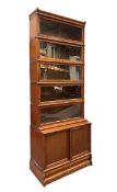 GLOBE WERNICKE - 20TH CENTURY OAK FIVE TIER & CUPBOARD BASE STACKING BOOKCASE