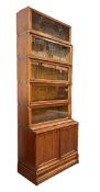 GLOBE WERNICKE - 20TH CENTURY OAK FIVE TIER & CUPBOARD BASE STACKING BOOKCASE