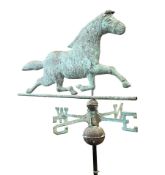 FOLK ART - COPPER WEATHER VANE IN THE FORM OF A HORSE WITH COMPASS POINTS