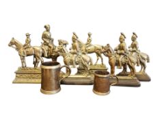 20TH CENTURY BRASS COATED IRON DOOR STOPS & TWO DRINKING TANKARDS