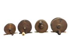 COLLECTION OF FOUR EARLY 20TH CENTURY BRASS FISHING REELS