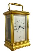 BRASS CARRIAGE CLOCK BY ST. JAMES, LONDON