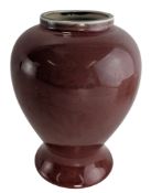 A CHINESE SANG DE BOEUF OXBLOOD GLAZED PORCELAIN VASE