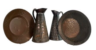 JOSEPH SANKEY - TWO ARTS & CRAFTS STYLE CROCODILE SKIN COPPER EWER JUGS AND PLATES