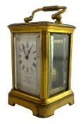 A MID 20TH CENTURY MINIATURE FRENCH BRASS CARRIAGE CLOCK