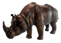 20TH CENTURY LIBERTY OF LONDON STYLE BROWN LEATHER RHINO
