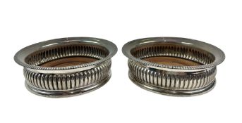 PAIR OF GEORGE III HALLMARKED SILVER WINE / CHAMPAGNE COASTERS