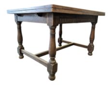 A LARGE EDWARDIAN OAK REFECTORY DINING TABLE