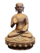 EARLY 20TH CENTURY BRONZE EFFECT BRASS TIBETAN SEATED BUDDHA FIGURE