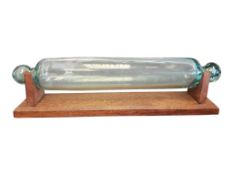 19TH CENTURY NAILSEA HAND-BLOWN GLASS ROLLING PIN ON STAND