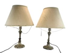 A PAIR OF 19TH CENTURY SILVER PLATED CONVERTED CANDLESTICKS - TABLE LAMPS