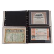 Interessante Sammlung historischer Wertpapiere in 2 Alben -