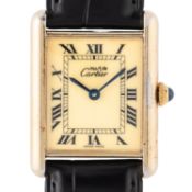 CARTIER Tank Vermeil Herrenuhr Ref. 590005 mit neuer Revision, Box und Papiere 1991. 