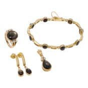 Schmuckset mit schwarzen Sternsaphiren und Zirkonia, 