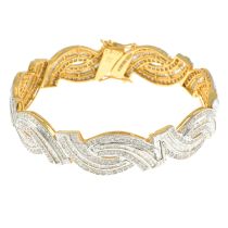 A vari-cut diamond hinged bangle