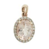 A morganite & diamond cluster pendant