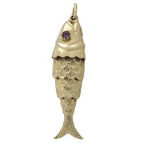 An amethyst articulated fish charm/pendant