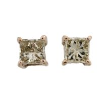 A pair of diamond single-stone stud earrings