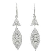 A pair of diamond drop earrings