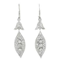 A pair of diamond drop earrings