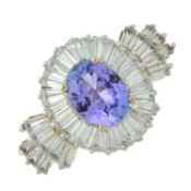 A 9ct gold tanzanite & diamond cluster ring
