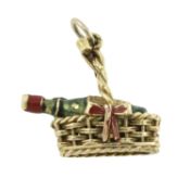 A mid 20th century 9ct gold enamel port bottle charm, by Georg Jensen
