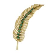 A mid 20th century gold and emerald leaf brooch, by Van Cleef & Arpels