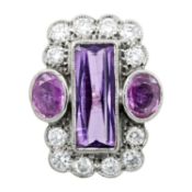 An 18ct gold sapphire and diamond ring