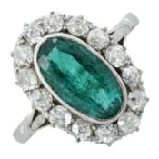 An emerald and old-cut diamond cluster ring