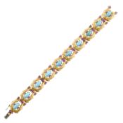 A mid 20th century textured 18ct gold turquoise and ruby bracelet