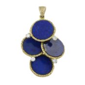 A diamond and lapis lazuli pendant