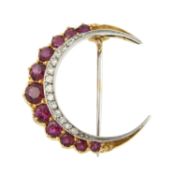 A ruby and diamond crescent moon brooch
