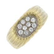 A diamond signet ring, with grooved surround