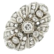A mid 20th century gold diamond bombé ring
