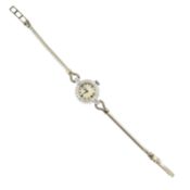 A mid 20th century platinum and diamond watch, with 9ct gold bracelet, by Girard Perregaux