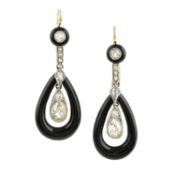 A pair of Art Deco platinum and gold, diamond and onyx earrings