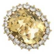 A citrine and diamond cluster ring