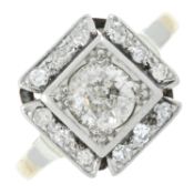 A mid 20th century platinum, 18ct gold and diamond ring