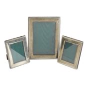 Pair of 3.5" x 2.5" silver mounted photograph frames & a matching 6" x 4" frame (3)
