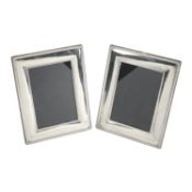 Pair of 5" x 3.5" silver mounted photograph frames
