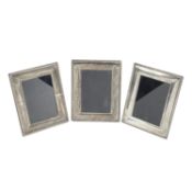 Set of three 5" x 3.5" silver mounted photograph frames