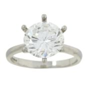 A loose 3.05ct diamond, with platinum ring mount