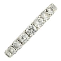 A platinum diamond half eternity ring