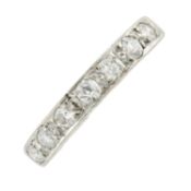 An 18ct gold diamond half eternity ring