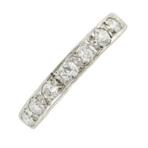 An 18ct gold diamond half eternity ring
