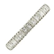 An 18ct gold diamond half eternity ring