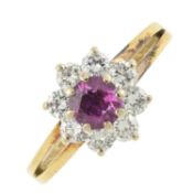 An 18ct gold ruby & diamond cluster ring