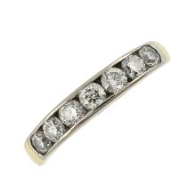 An 18ct gold diamond half eternity ring